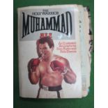 Boxing - Muhammad Ali Biography, by Atyeo and Dennis with loose newspaper and magazine articles.