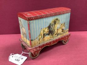 Mid XX Century Wheeled Tin, with hinged roof depicting tigers in a circus train, probably by Chad