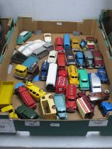 A quantity of predominantly original 're-painted' diecast model vehicles by Dinky, Corgi including
