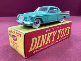 Dinky Toys No 169 Studebaker Golden Hawk, cream/green, overall very good, boxed, some staining/