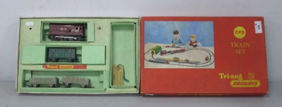 A Triang #RP.B "OO" Gauge Clockwork Train Set. Comprising of 0-6-0 Locomotive (Faults include spring