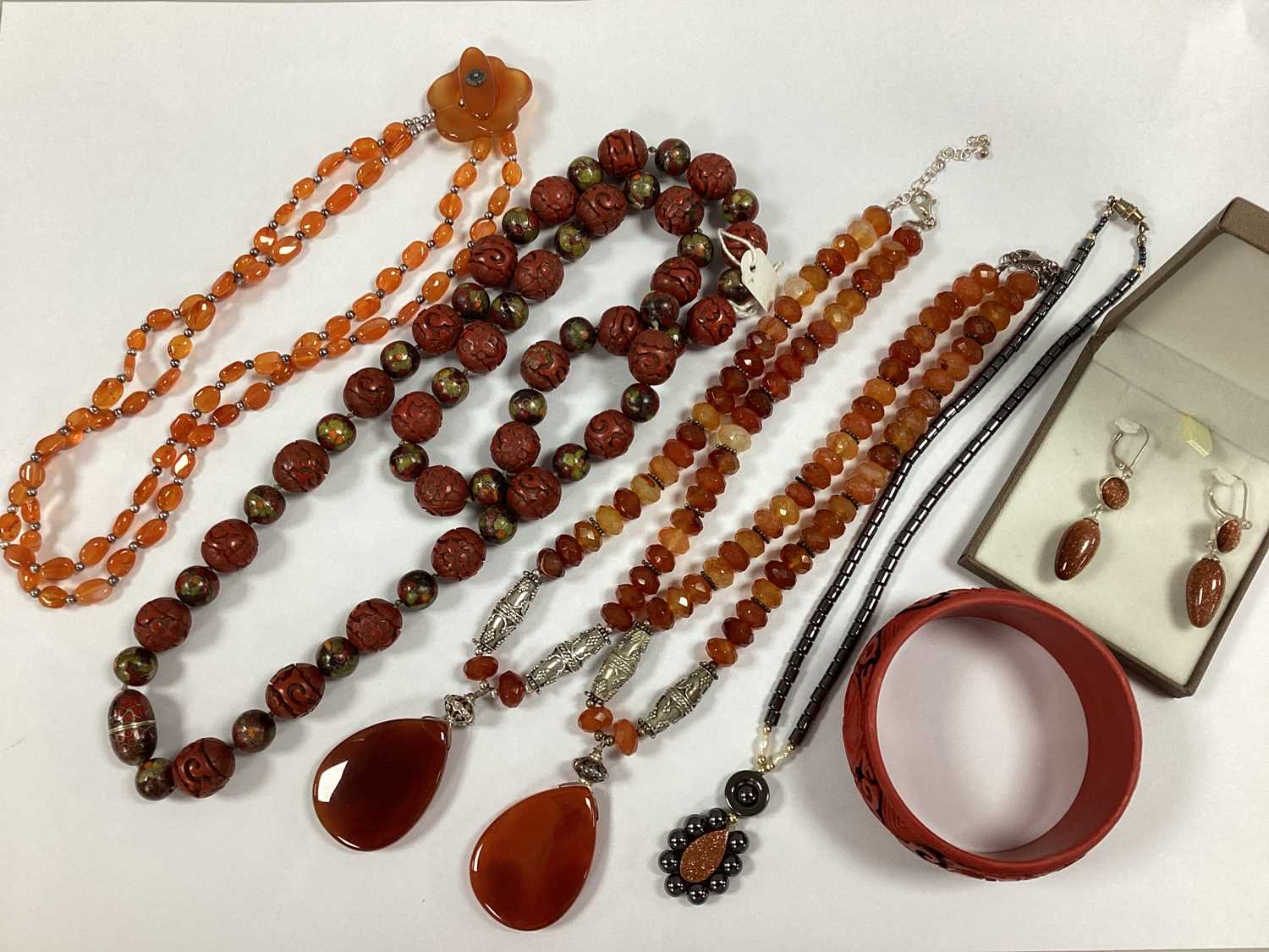 A Small Collection of Hardstone Jewellery, including a multi-strand necklace, to flowerhead design