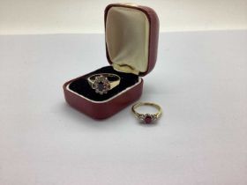 A Diamond Set Three Stone Ring, claw set, stamped "18ct&Plat" (finger size L); A 9ct Gold Cluster