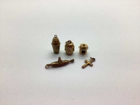 Novelty Charm Pendants, two stamped "9ct", including cocktail shaker, cross, barrel, submarine, etc.