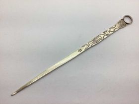 A Meat Skewer, with engraved decoration and loop handle (25.7cm long).