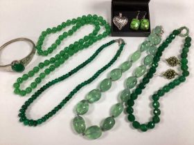 A Collection of Modern Polished Hardstone Jewellery, in hues of green, including three bead