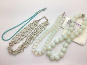 A Modern TGGC Sky Blue Apatite Bead Necklace, together with a large bead necklace, to magnetic