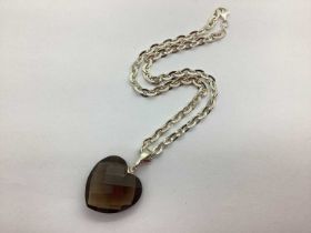 A Fancy Link Chain, suspending a faceted hardstone heart-shaped pendant, stamped "925".