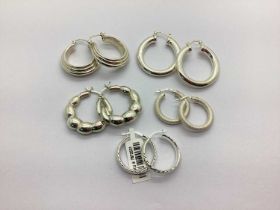 A Variety of Modern "925" Hoop Earrings, to include sleeper hoop style, creole design, statement