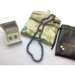 Honora; A Peacock Coloured Freshwater Pearl Necklace, clasp stamped "14K", together with a pair of