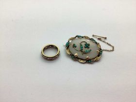 A Decorative Antique Oval Panel Brooch, inset cabochon turquoise highlights; together with a 9ct