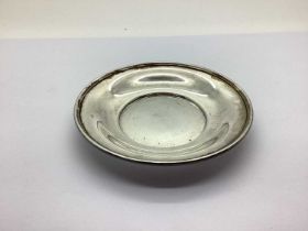 A Hallmarked Silver Dish, London 1932, of plain circular form, 13.3cm diameter (110grams).