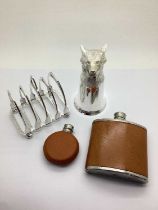 A Novelty Plated Stirrup Toast Rack, with stirrup loop handle, raised on four bun feet, overall