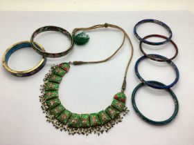 An Indian Inspired Enamel Neckace, each decorative panel inset, supending bead fringe, to cord and