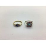 An 18ct Gold Diamond Set Three Stone Ring, graduated collet set (finger size O); together with a