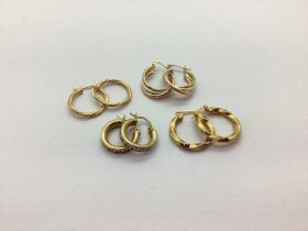 Modern 9ct Gold Hoop Earrings, "375" etc. (4 pairs) The total weight is 7 grams.