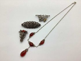 A Decorative Marcasite Set Drop Necklace, marcasite set brooches, etc.