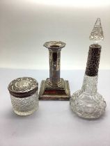 A Hallmarked Silver Candlestick, 13cm high (weighted); together with a decorative hallmarked