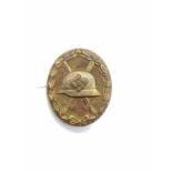 WWII Third Reich German Wound Badge Gold Grade. Due to the nature of these items we politely