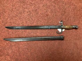WWII Imperial Japanese ArisakeType Bayonet and Scabbard, bayonet manufacturer mark represents Kokura