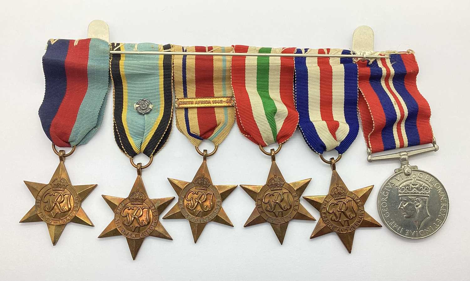 WWII RAF Fighter Command Air Crew Europe Star Medal and Log Book Grouping, plus cloth insignia, - Image 7 of 7