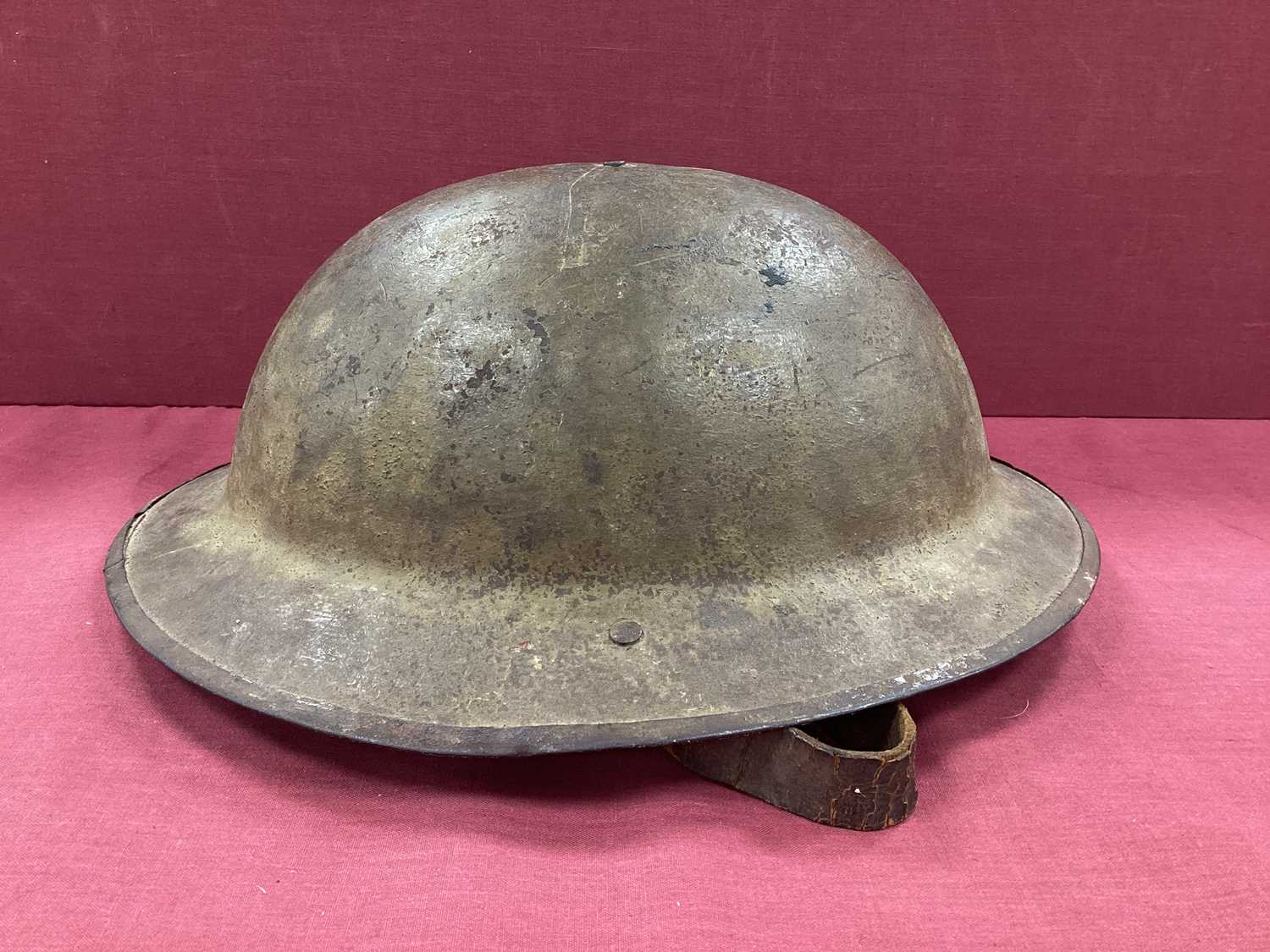 WWI British Army Brodie Mk I steel helmet with part liner and leather strap, marks on the interior - Image 2 of 11