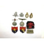 Collection of Predominantly British Military Badges and Clocth Insignia, relating to the Rifle