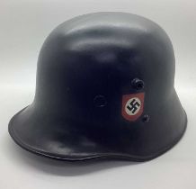 WWII M16 transitional helmet with more recent paint/decals, plus, liner and chin strap. Marks on