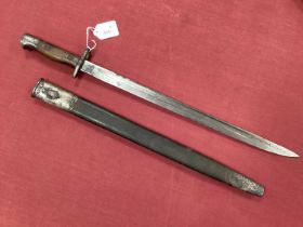British 1907 Pattern Bayonet and Scabbard, with various marks on blade ricasso including year '15'?,