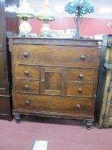 XIX Century Mahogany Chest of Drawers, with a long drawer, over a panelled cupboard door, four small