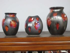 Poole Pottery Black Lustre Ovoid Shaped Vase, with random red splash motifs, 24cm high, two others