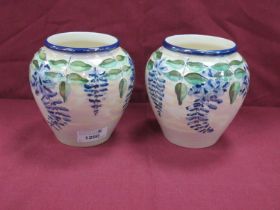 Two Lisa B Moorcroft for Moorland Pottery Ovoid Vases, decorated with Wisteria on cream ground,