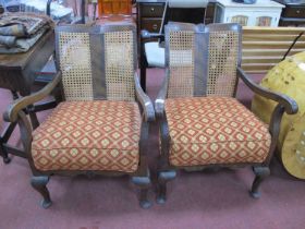 Pair of 1920s Walnut Parlour Armchairs, with carved shell motifs and bergeres back (2)