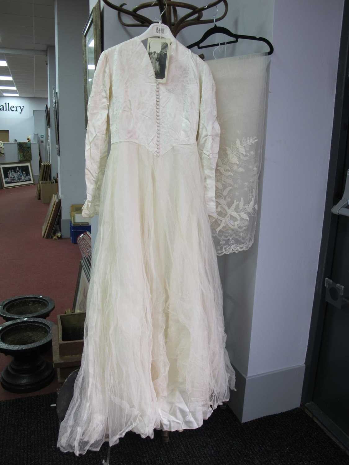 A Circa 1950'S Wedding Dress, the cream damask fitted bodice with centre front button fastening - Image 2 of 2