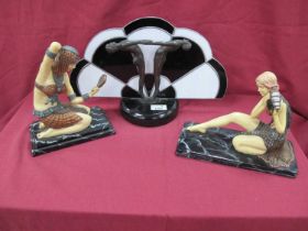 Two Art Deco Inspired Resin Seated Lady Figurines, on rectangular bases, the widest 24.5cm.