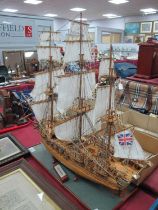 Hand Built Scale Model of HMS Pandora, three masted gun ship, approximately 60cm high, 74cm long