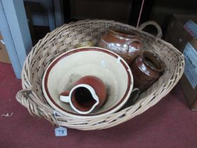 Earthenware Pancheon, 33.5cm diameter, salt glaze jars, etc, in a basket. Crazing present