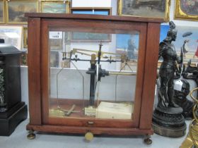 Baird & Tatlock Laboratory Scales, in a display cabinet, bakelite weights.