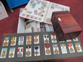 Stamps; an accumulation of stamps, minisheets, revenues, stationery cut-outs, plus an album of