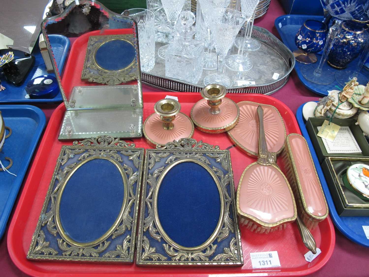 Pair of XX Century Brass Scrollwork Photo Frames, with oval aperture, an early XX Century mirrored