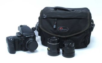 Mamiya 645 Pro Camera, having Mamiya - Sekor 80mm lens 1:2.8, extra 150mm 1:3.5 and 55mm 1:2.8