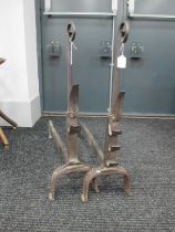 Pair of XIX Century Andirons, each with hooks to plinth, and scroll shaft, 79cm high.