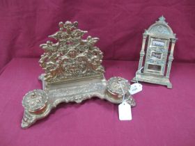 Gilded Brass Desh Stand, with C scroll decoration, two ink wells, together with a gilded brass