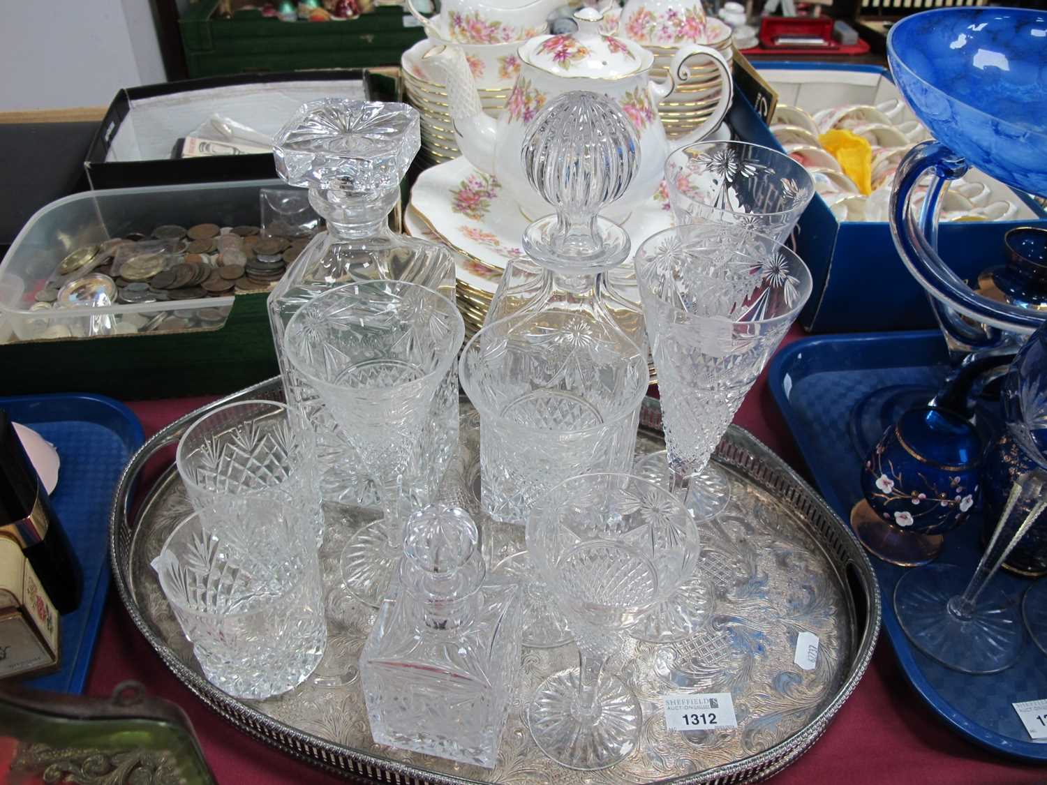 Two Whiskey Decanters Plus Two Glasses, five fluted glasses, scent bottle, plated oval tray.