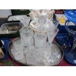 Two Whiskey Decanters Plus Two Glasses, five fluted glasses, scent bottle, plated oval tray.