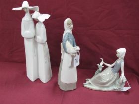 Three Lladro Figure Groups, of Two Nuns, a girl holding a lamb, and a girl and bird on a branch (