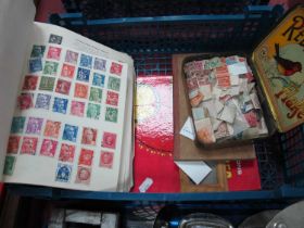 Stamps; A small accumulation of World Stamps, early to modern, housed in three albums and loose,