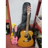 Yamaho F-310 Acoustic Guitar, Jay Turser JTA-67N/GS acoustic guitar, one with soft case. Mad about