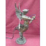 Winged Siren Figural Bronzed Lamp, on circular base, 36cm high.