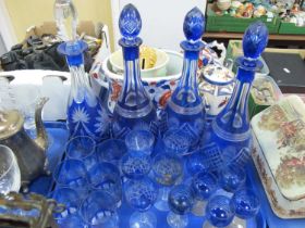 Four Blue Flash Glass Decanters (one stopper absent), similar drinking glasses.